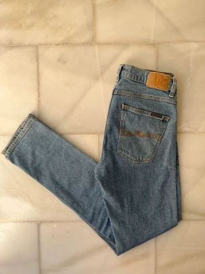 Ljusblå jeans från Nudie Jeans  - Ljusblå jeans från Nudie jeans i fint skick, modellen är Lean Dean 😁                                          ——————————————————————————                                                          📐| Storlek: 30-32                                                  👖| Märke: Nudie Jeans                                         🔎 | Skick: Fint skick!                                              💵 | Ny Pris: 1599kr                                                 ✍🏻 | Skriv om du har några frågor 