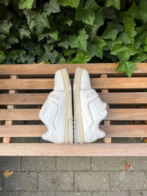 White sneakers - Great condition though there are signs of use. Size 43(EU). You know why the price is like that 😉