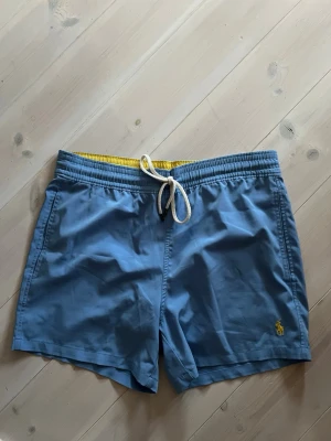  Badbyxor från Polo Ralph Lauren - Snygga blå badbyxor från Polo Ralph Lauren fint skick