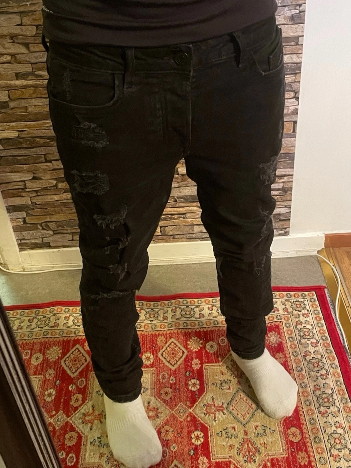 Svarta ripped jeans med slim fit