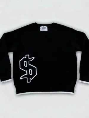 Svart stickad tröja med dollartecken - Cool svart stickad tröja från Jaded London med ett stort vitt dollartecken på framsidan. Tröjan har rund hals, långa ärmar och vita detaljer vid muddar och nederkant. Perfekt för dig som gillar streetwear och vill sticka ut.