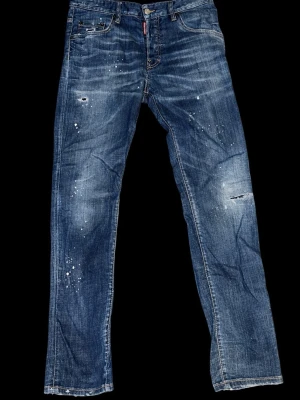 Blå jeans med slitningar och stänk - Storlek 50 , äkta