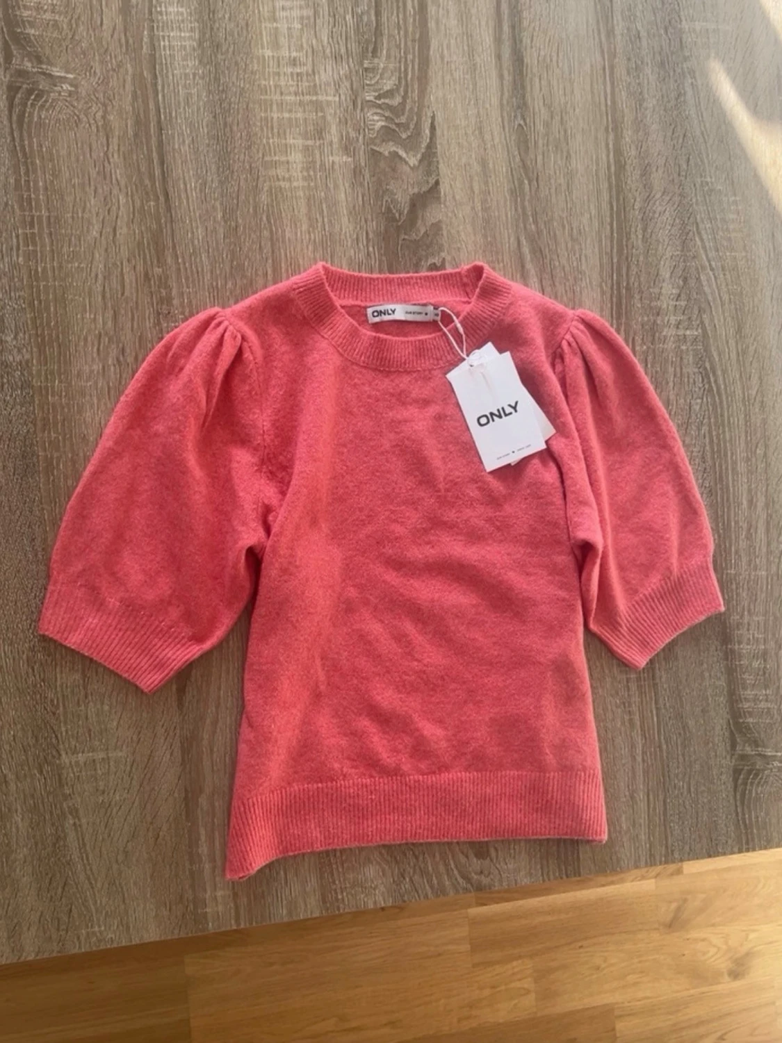 Korallröd stickad topp