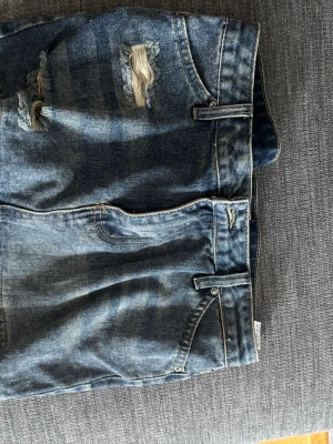 Lågmidjad jeans kjol  - Helt oanvänd i S 