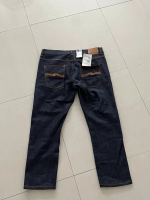 Nudie lean Dean  - Säljer ett par helt oanvända nudie lean från jeans i storlek W36 L32. Hör av er vid frågor!