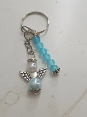Lyckoämgel  - Lykoängel nyckelring. Finns i alla olika disaginer. Helt nya, egen gjorda. Pris kan diskuteras 