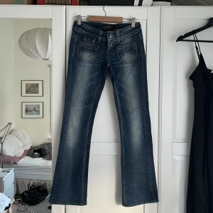 mörkblå jeans - lågmidjade bootcut jeans