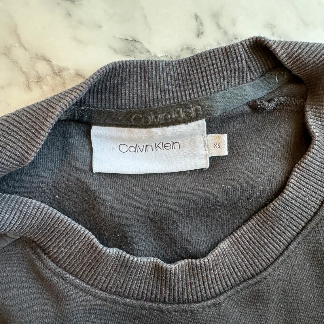 Ljussvart Calvin Klein tröja - 91