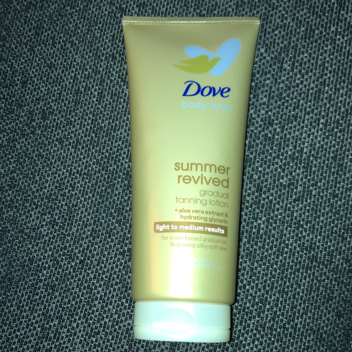 Dove lotion tan