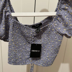 Topp - Blommig topp❤️