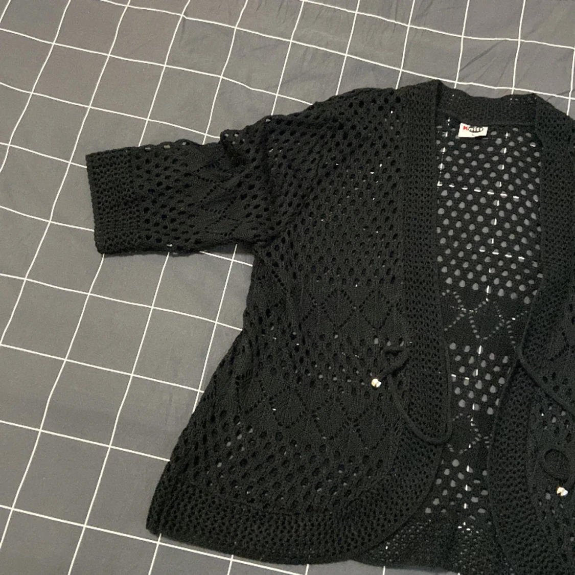 En svart stickad tröja