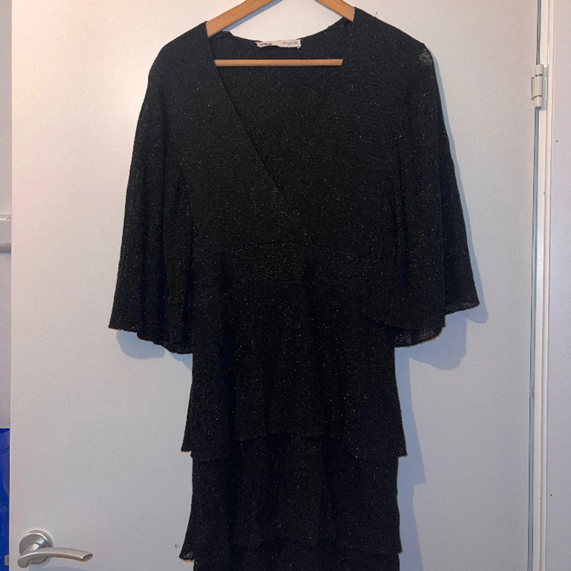 Svart glittrig klänning 