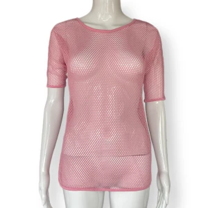 Rosa Fishnet Topp - I fint skick, från Skill, storlek 158/164. 100% polyamid. Dockan använder storlek XS.