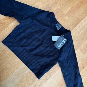 Tränings tröja  - Fin seamless träningströja ifrån aimn helt oanvänd. 