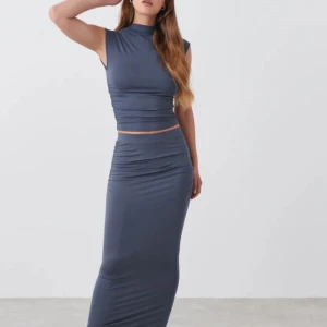 Kjol och topp - Säljer mitt fina set, i superfint skick, säljer då det ej passar längre!!