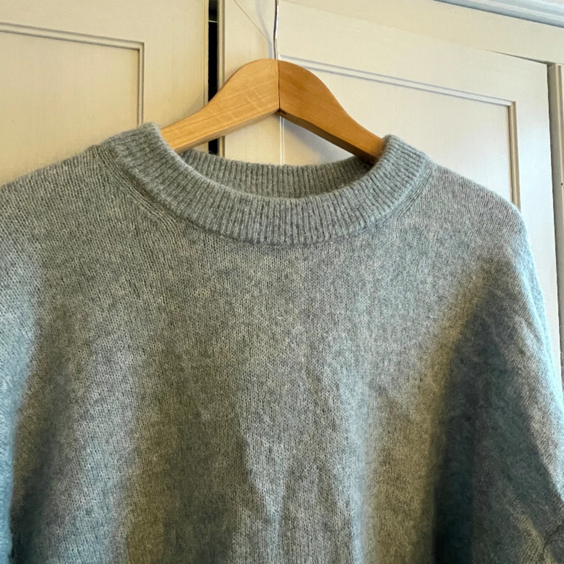 Blå stickad tröja i mohair  - 90