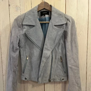 Biker jacket  - Baby blue suede biker jacket from Vila. Fits small and medium 