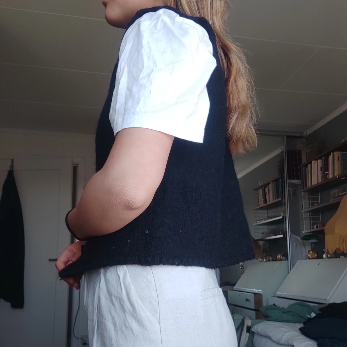 Svart ylleväst - 91