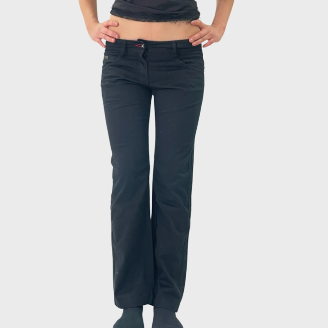 39. Svarta lågmidjade kostymjeans 