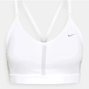 Nike sport bh  - Vitt Nike sport bh. Säljer den för den inte kommer till användning längre. Skriv vid intresseo o om egen bild önskas 💞