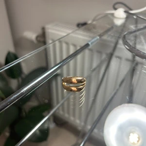 Guldring dubbel - Guldring, guldpläterad. Köptes för 99:-