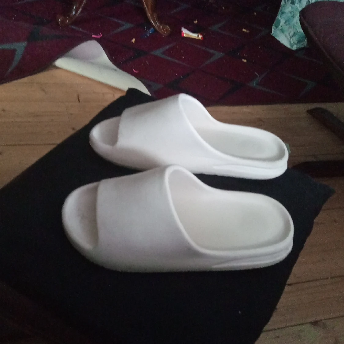 Adidas yeezy slides.  - 90