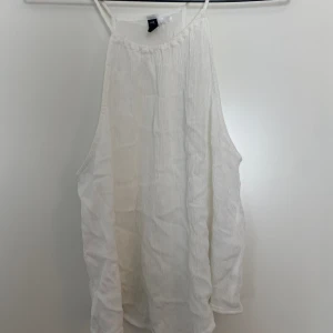Linne/blus - Ett linne från H&M i storlek 42