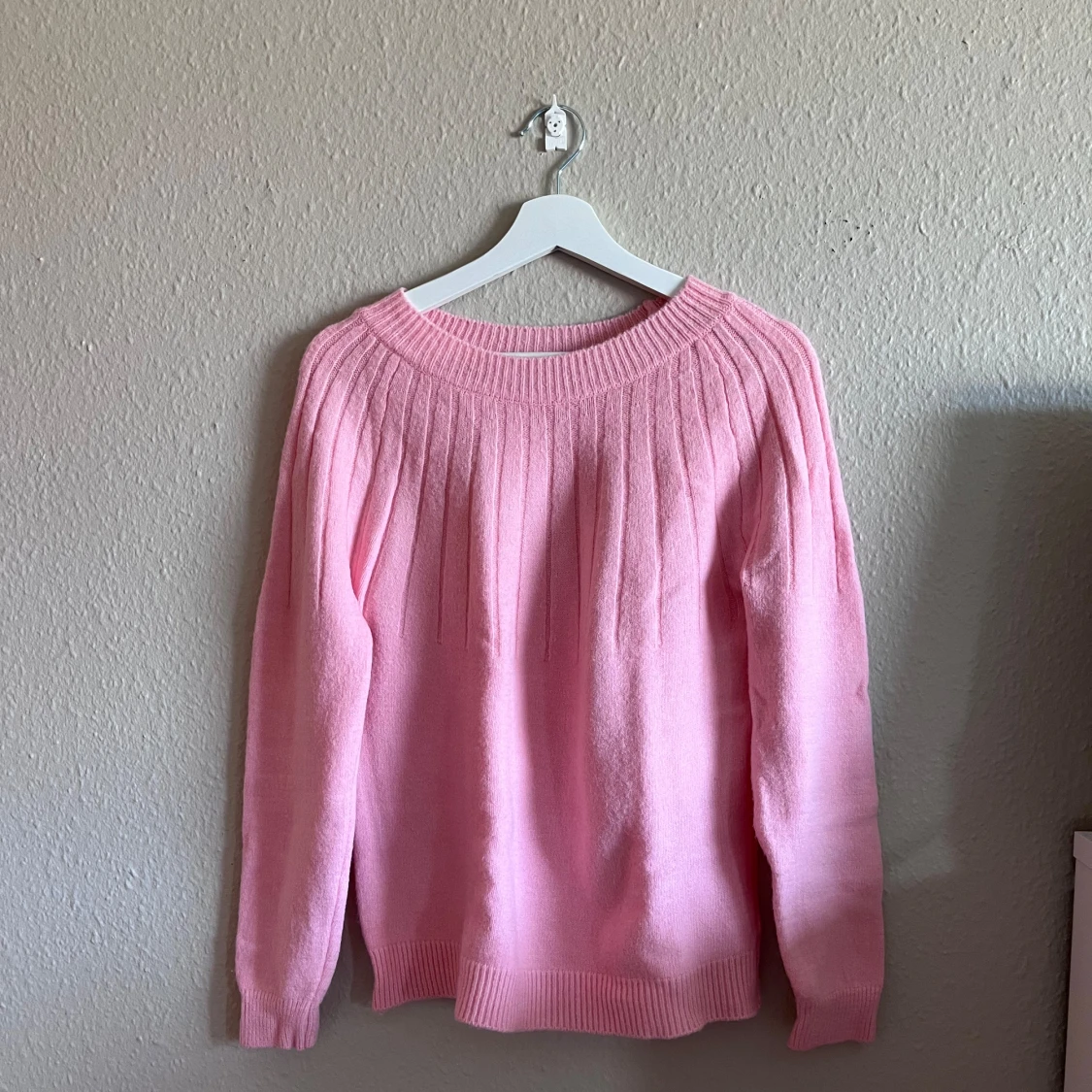 Rosa stickad tröja