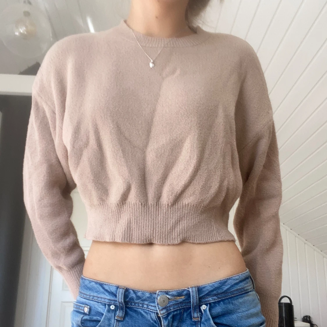 Beige croppad tröja