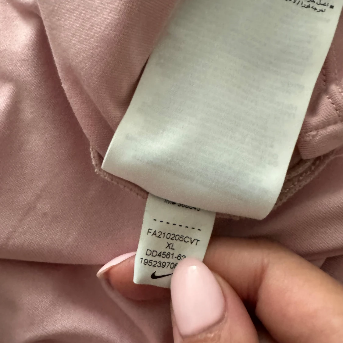 Ljusrosa linnetopp från Nike - 93