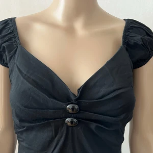 Collectif vintage klänning Rockabilly, 50-tal, 60-tal, retro - Inget att anmärka på.