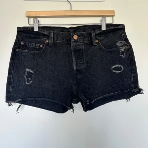 Denim Shorts  - Black denim shorts. I've only worn them a couple of times. W29, but fits like M