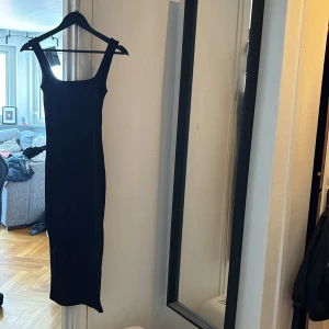 Klänning  - Taghit lång klänning 