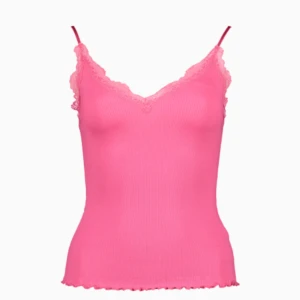 Rosa spetslinne  - Säljer mitt superfina rosa spetslinne som aldrig använts.