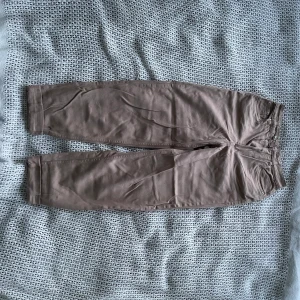 Beigea byxor - Beiga byxor