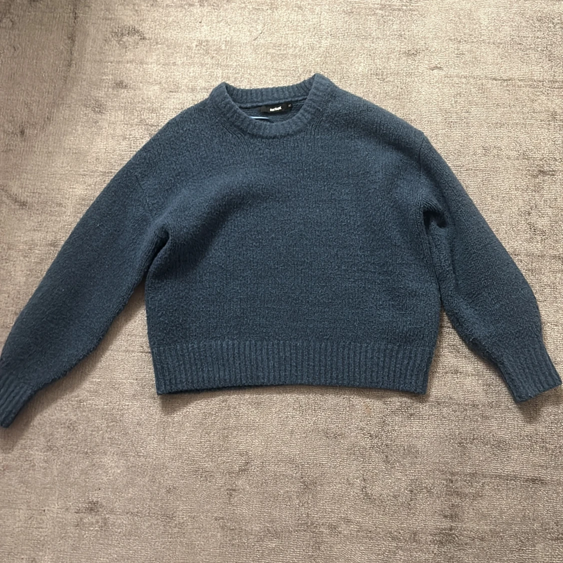 Blå stickad tröja