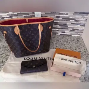 Authentic Louis Vuitton Monogram Neverfull MM gently used with matching color pouch