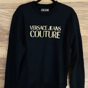 Versace - Perfekt skick! Strl L