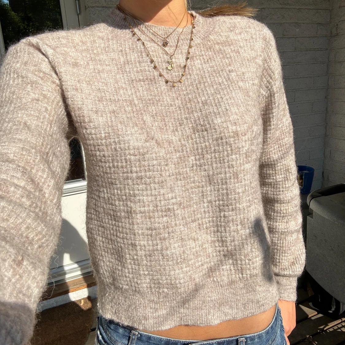 stickad tröja beige