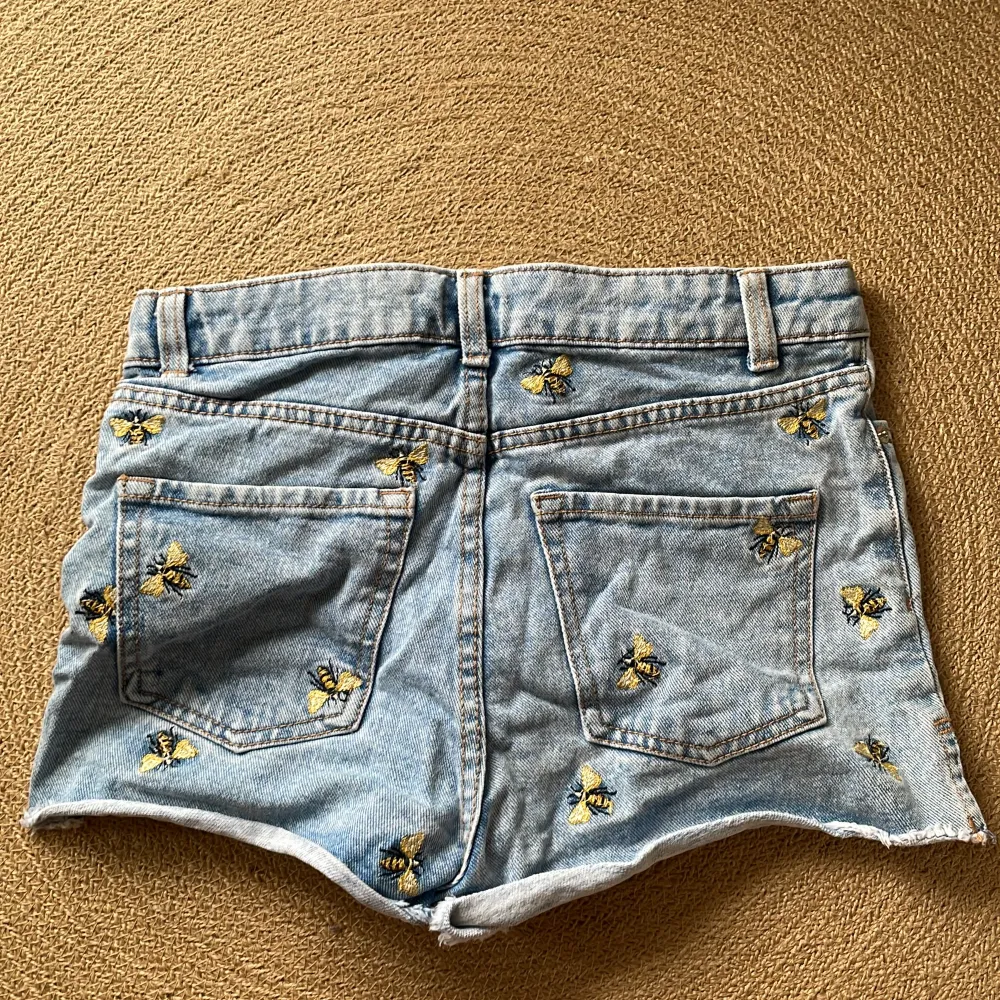 Embroidered bee jeans shorts  Used but in good condition . Shorts.