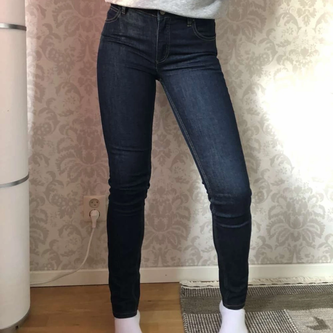 Mörkblåa jeans strl 25/32