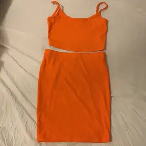 Klänning. Orange. XS 