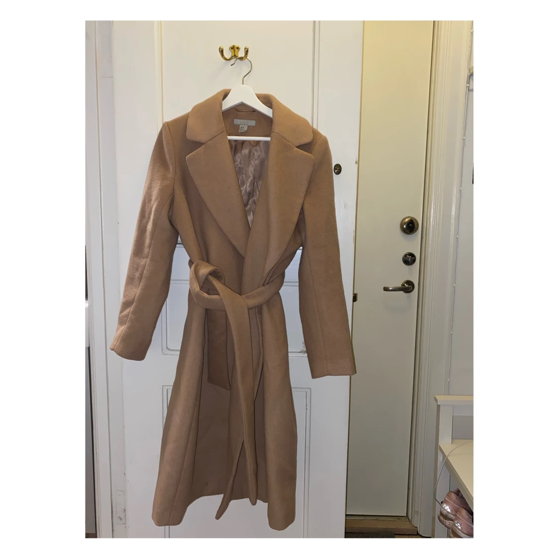 Lång brun jacka - 91