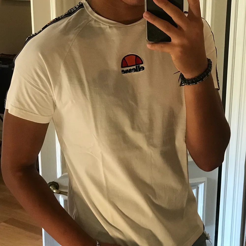 Rarely worn white Ellesse t shirt. Muscle fit t shirt bought from Caliroots. T-shirts.