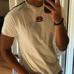 Rarely worn white Ellesse t shirt. Muscle fit t shirt bought from Caliroots
