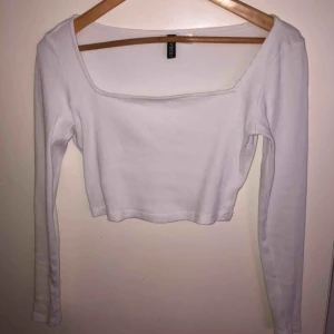  - Använd en gång, dock ett hål vid armhålan! Magtröja