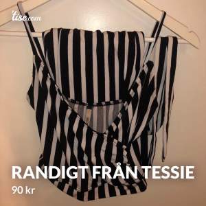 Randiga byxor med tillhörande topp från Tessie. Använt en gång! 