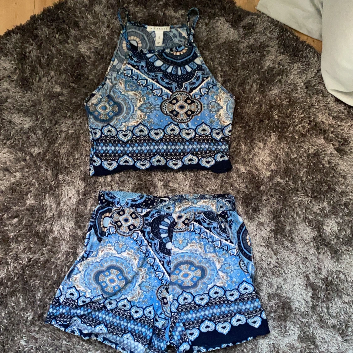 Blått mönstrat set, strl S