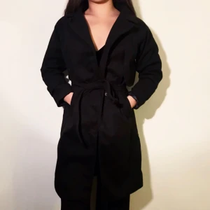  - Oanvänd kappa. Säljes för 50kr, frakt tillkommer.  Betalning sker via swish 