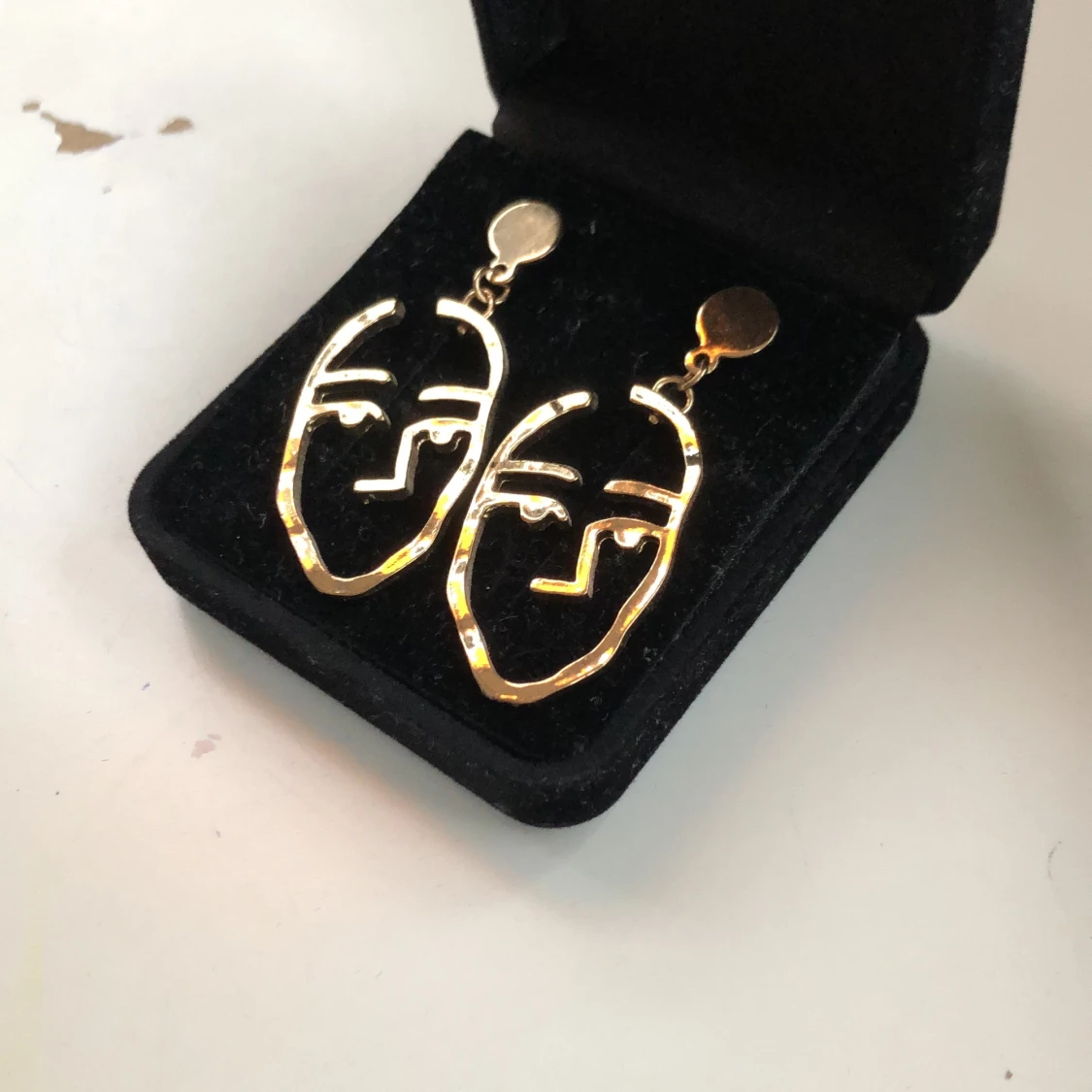 Oanvända guldörhängen  - 91